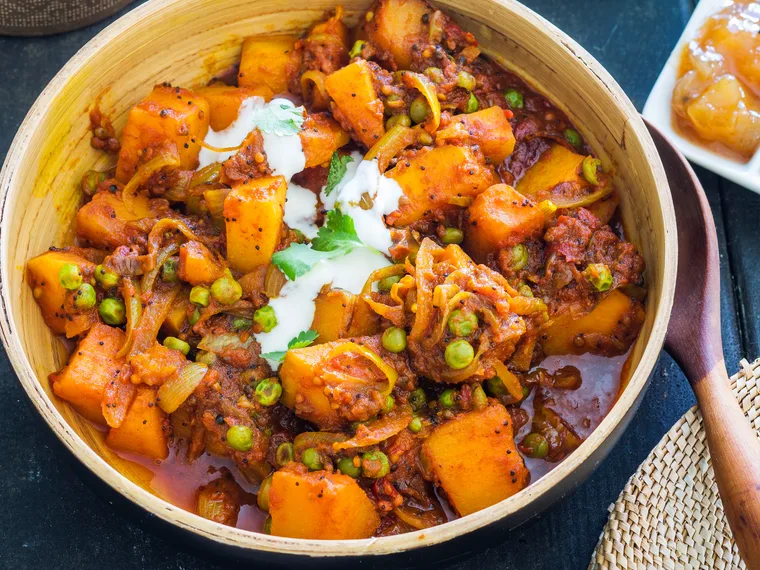 Tender pumpkin and pea curry