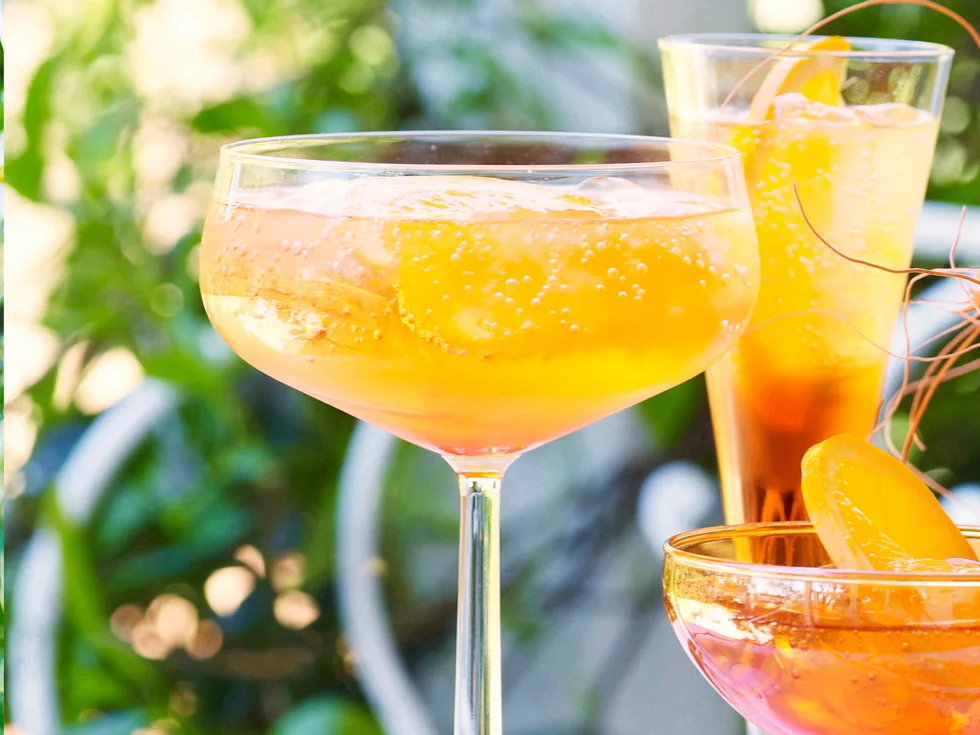 White sangria with peaches and raspberries