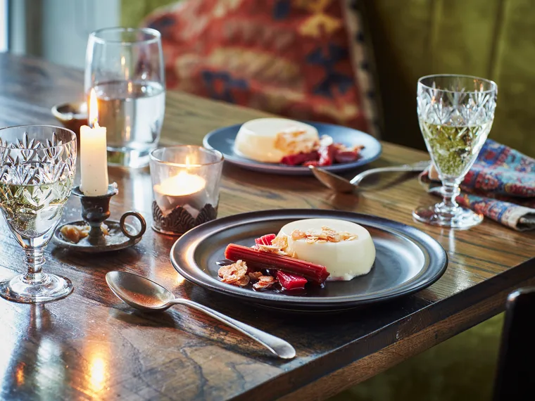 Orange-blossom panna cotta with baked rhubarb and sugared almonds