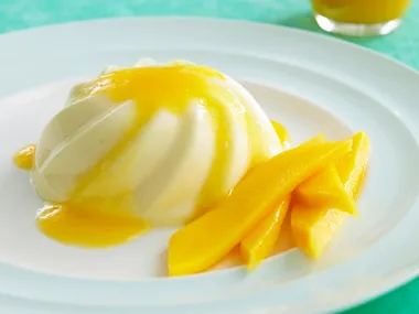 Coconut panna cotta with mango rum coulis