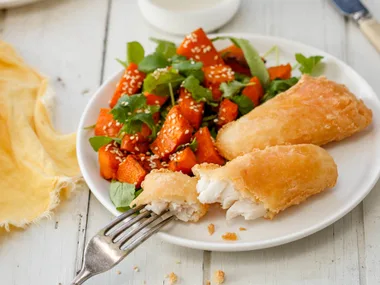 Fish with pumpkin, almond and rocket salad
