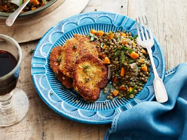 Parmesan and lemon crumbed chicken with lentil salad