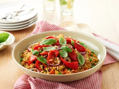 Pearl couscous with capsicum, red onion and pine nuts