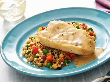 Steamed lemon fish with pearl couscous and chickpeas