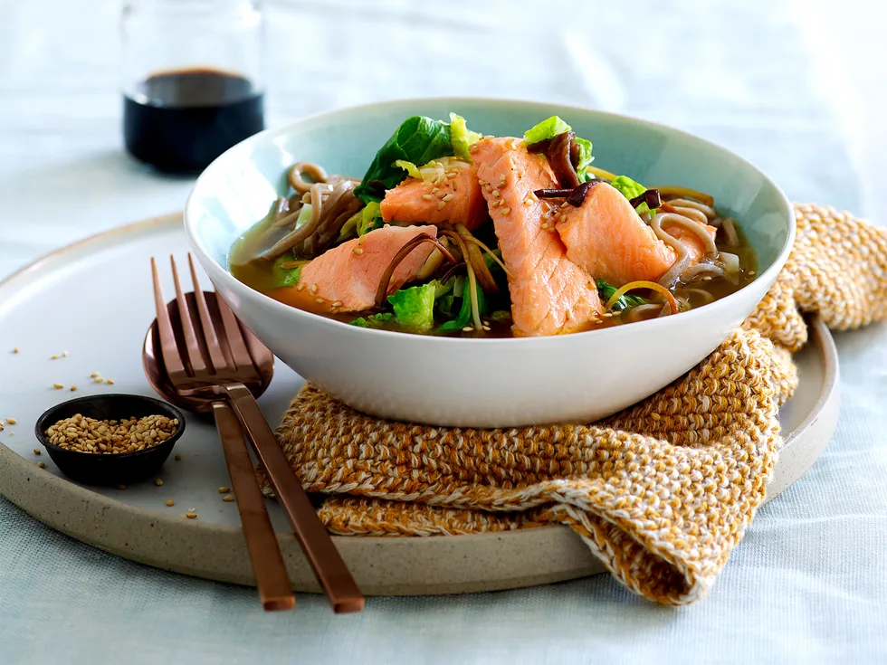 Salmon noodle soup with wild mushrooms, greens and toasted sesame