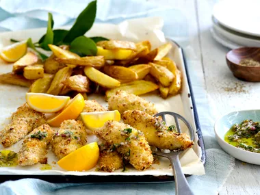 Marinated crispy fish strips with oven-baked chips