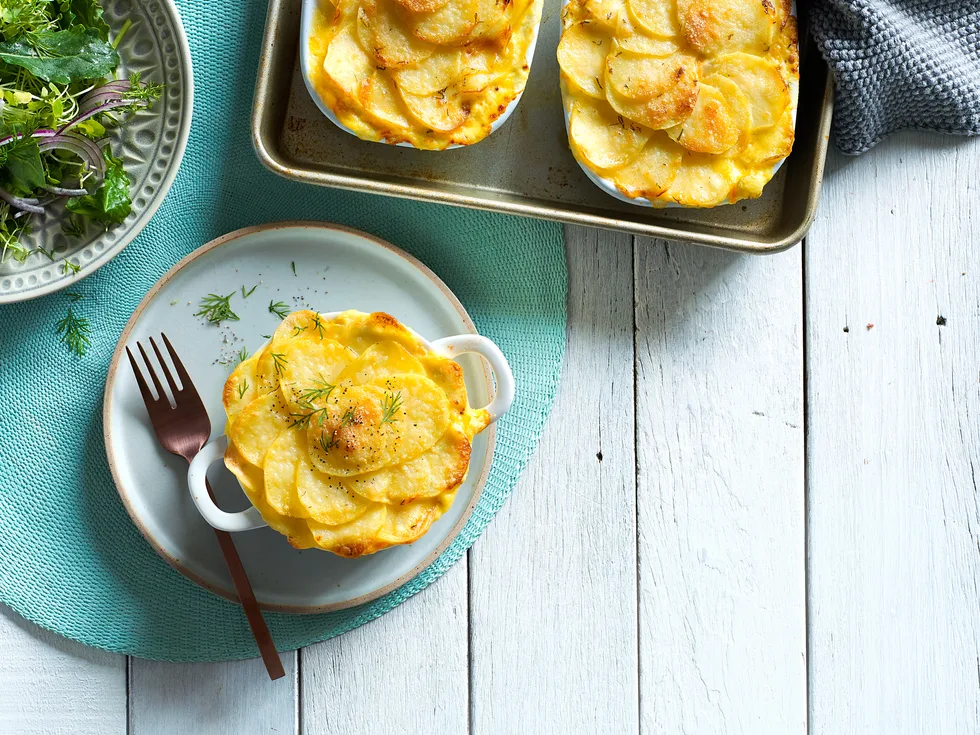 Creamy mornay fish hot pot with dill potato gratin