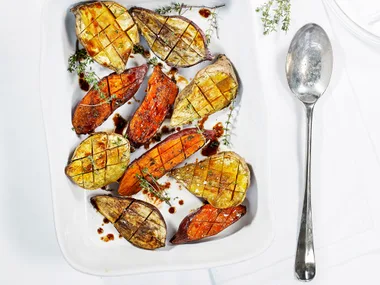 Roasted kumara with cinnamon and pomegranate drizzle