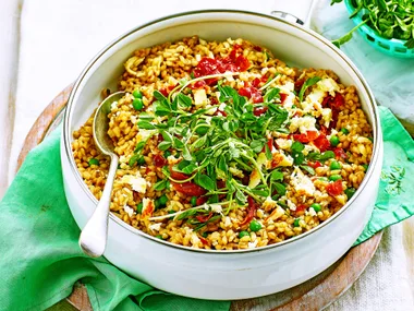 Pearl barley and pea risotto with haloumi crumbs