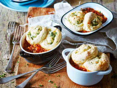 Sausage and bean casserole with parsley parmesan cobbler