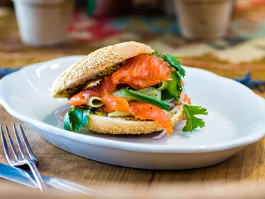 Cured salmon bagels with cucumber and coriander salad