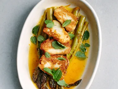 Orange-roasted asparagus with haloumi and mint