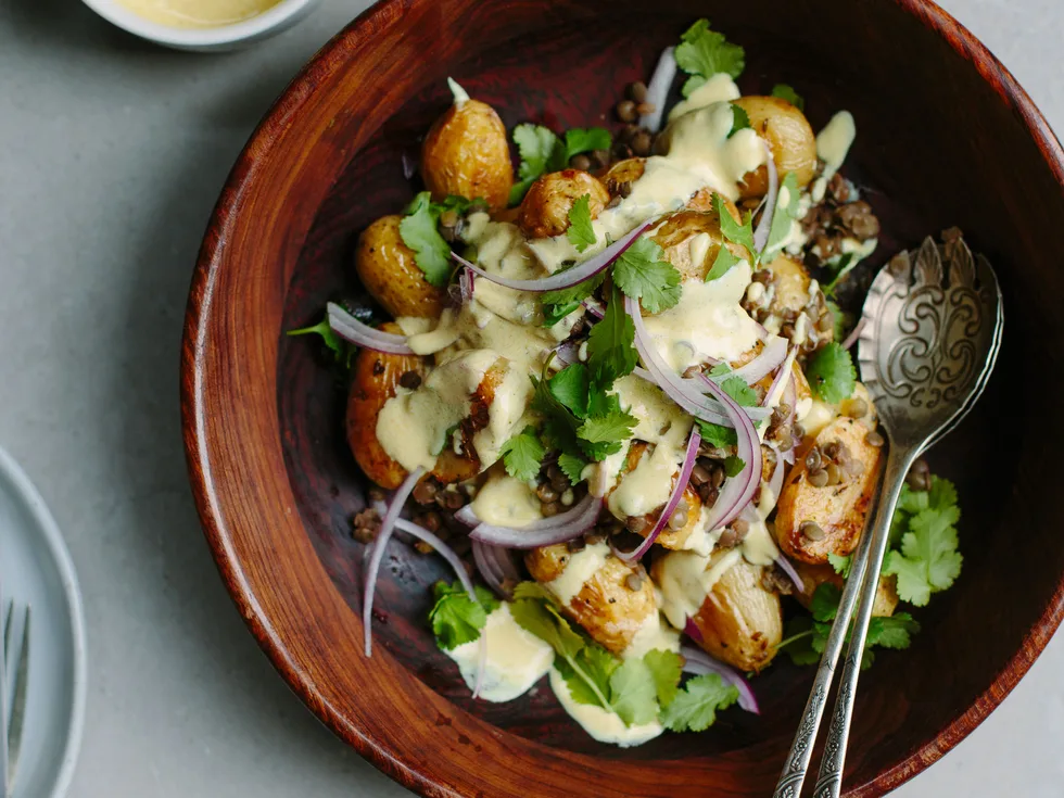 Roast potato salad with lentils and curried yoghurt dressing