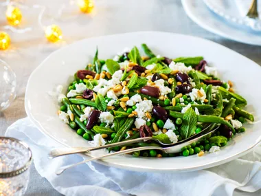 Green beans, peas with feta, olives and pine nuts