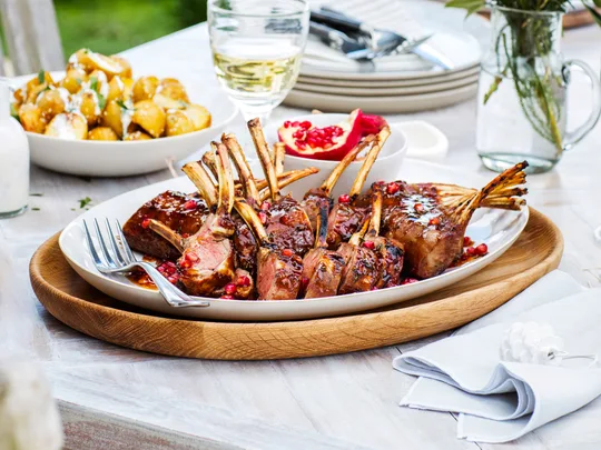 Barbecue lamb racks with pomegranate and quince glaze