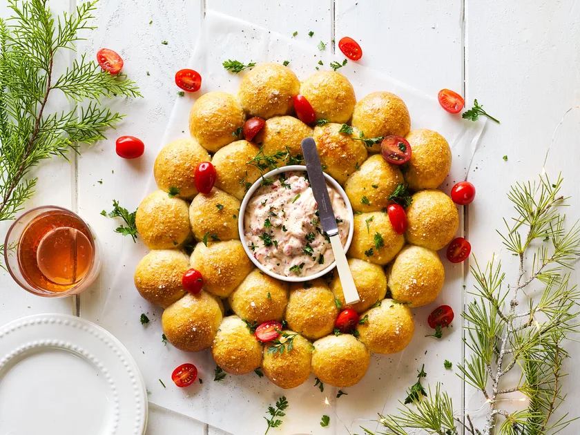 Tear and share herbed bread wreath with red pepper dip