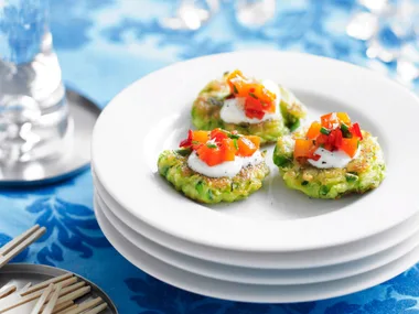 Zucchini fritters with yoghurt and spicy roasted capsicum salsa