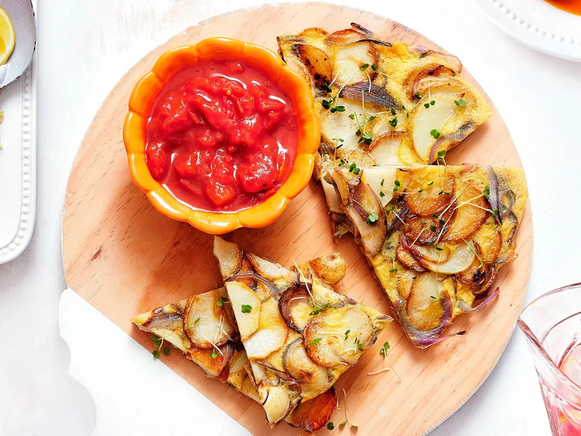 Spanish-style potato tortilla with spiced tomato sauce