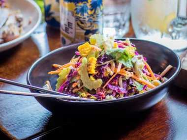 Grilled cabbage slaw with blue cheese and jalapeño