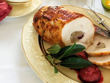 Rolled stuffed turkey breast with port and plum compote