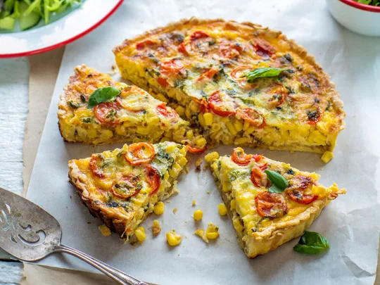 Caramelised onion, corn and tomato tart