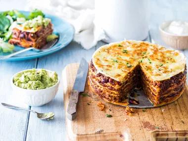 Easy beef and bean tortilla stack with guacamole