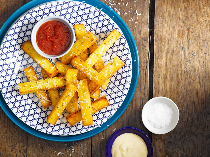 Polenta chips with parmesan, mayonnaise and tomato sauce