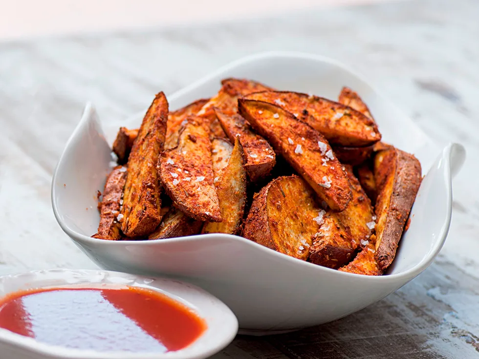 Cajun kumara wedges with BBQ sauce