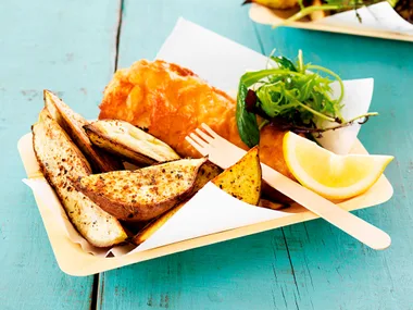 Cider-battered fish with spicy kumara wedges