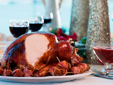 Pomegranate-glazed turkey with cranberry and pancetta stuffing