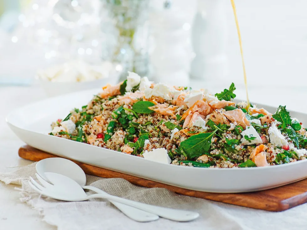 Spinach, kale and quinoa salad with orange and sesame dressing
