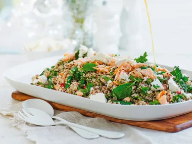 Spinach, kale and quinoa salad with orange and sesame dressing