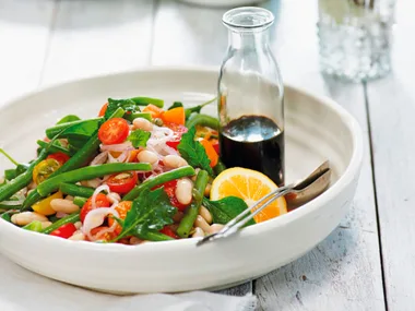 Bean and tomato salad with pickled shallots and balsamic drizzle