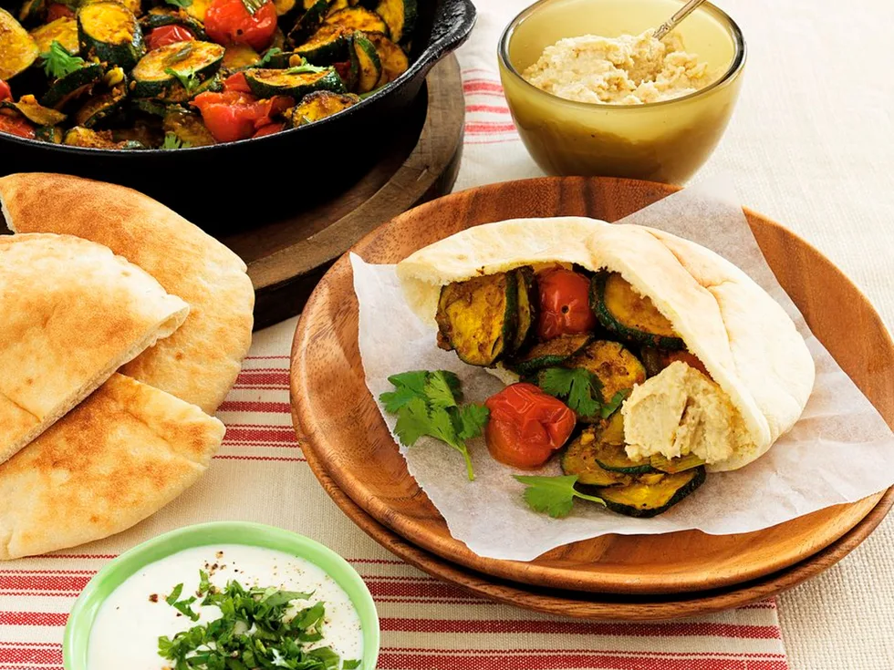 Courgette and tomato pita pockets
