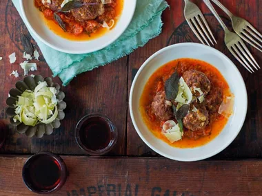 Mozzarella-stuffed meatballs with tomato and sage sauce