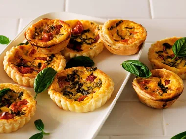 Roasted tomato and basil quiches