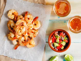 Barbecue prawns with avocado salsa
