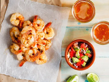 Barbecue prawns with avocado salsa