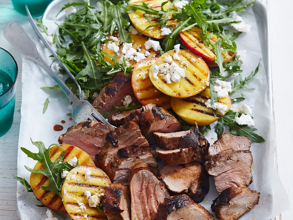 Maple-glazed pork with peach and rocket salad