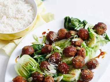 Teriyaki-glazed meatballs with Asian greens