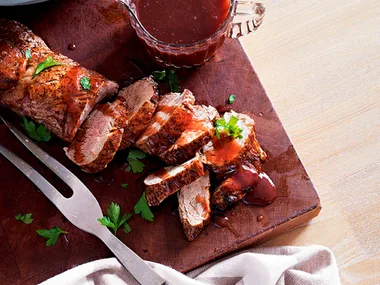 Pork fillet with plum and port sauce and creamy mustard mash