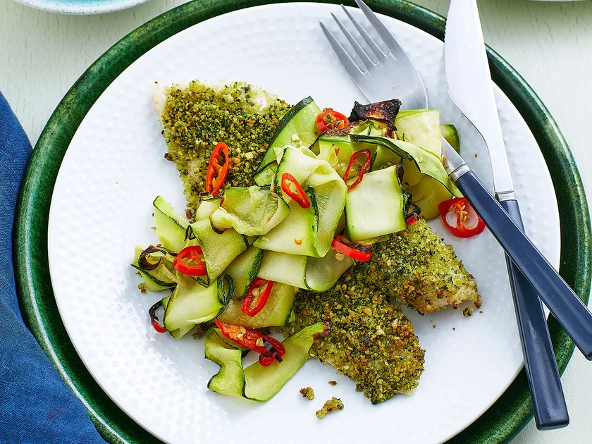 Baked herbed fish and courgettes