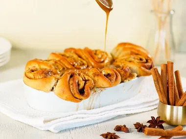 Apple cinnamon rolls with caramel cider sauce
