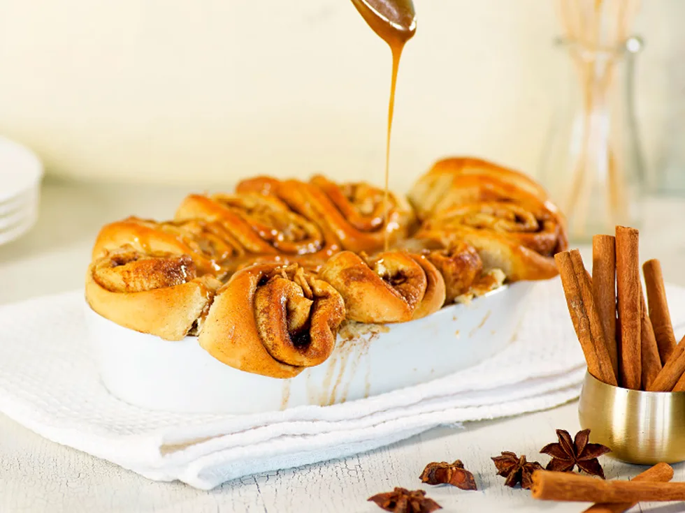 Apple cinnamon rolls with caramel cider sauce