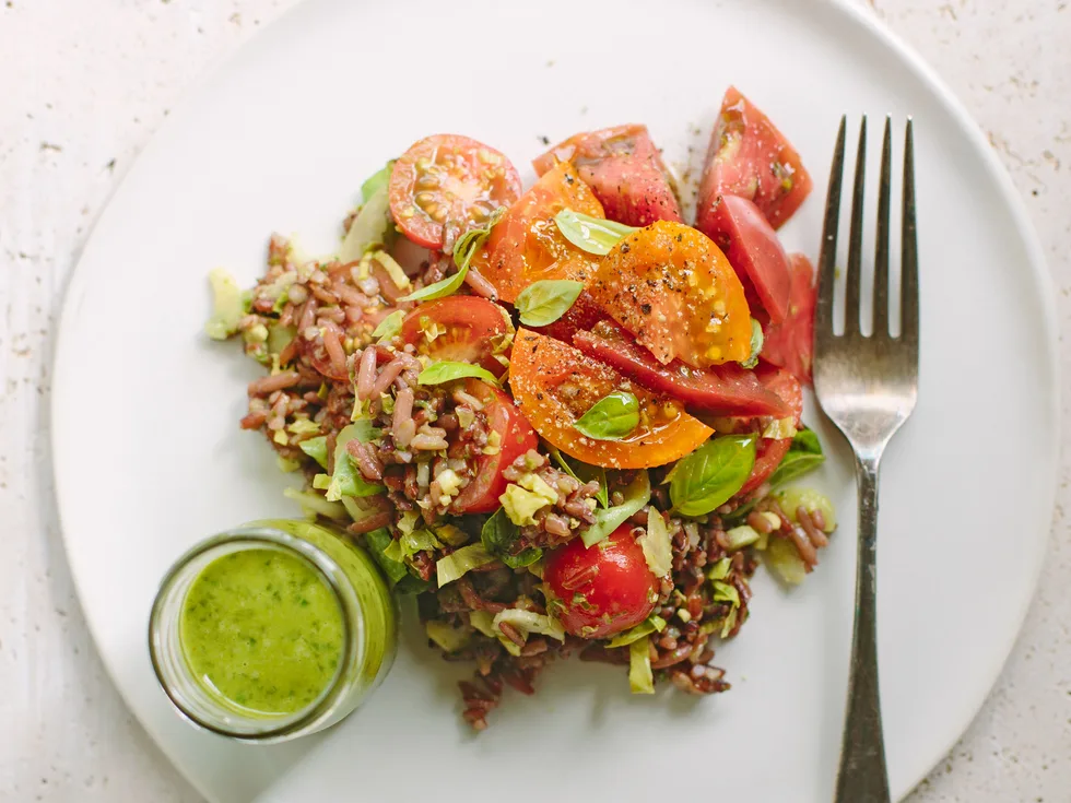 Mixed rice and tomato salad with basil dressing