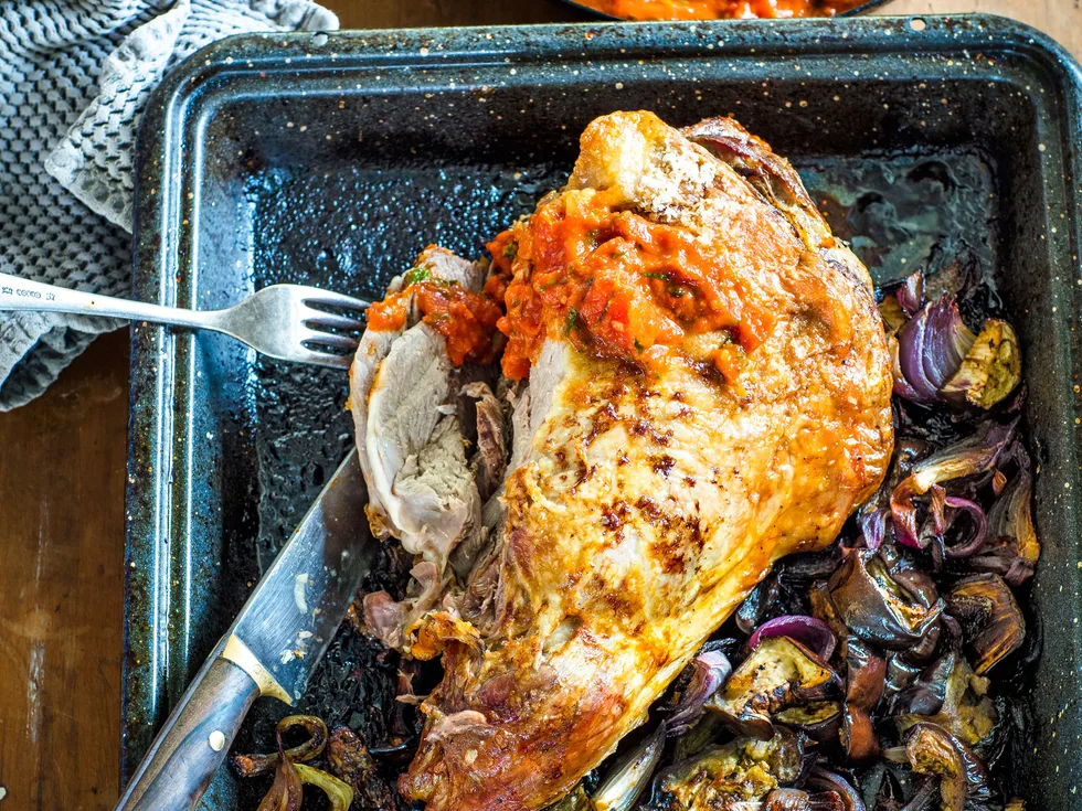 Roasted lamb and eggplants with tomato, parsley and anchovy sauce