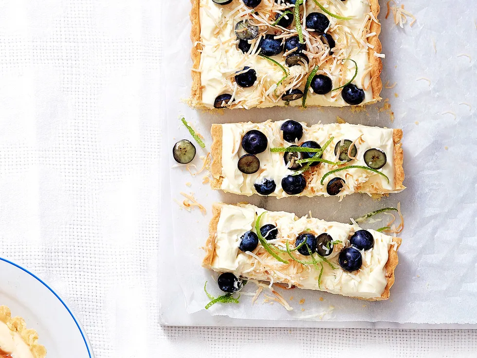 Coconut, lime and blueberry cheesecake tart