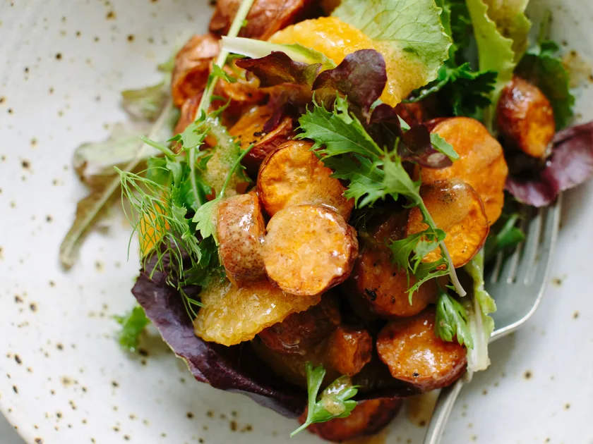 Roasted kumara and orange salad with miso dressing
