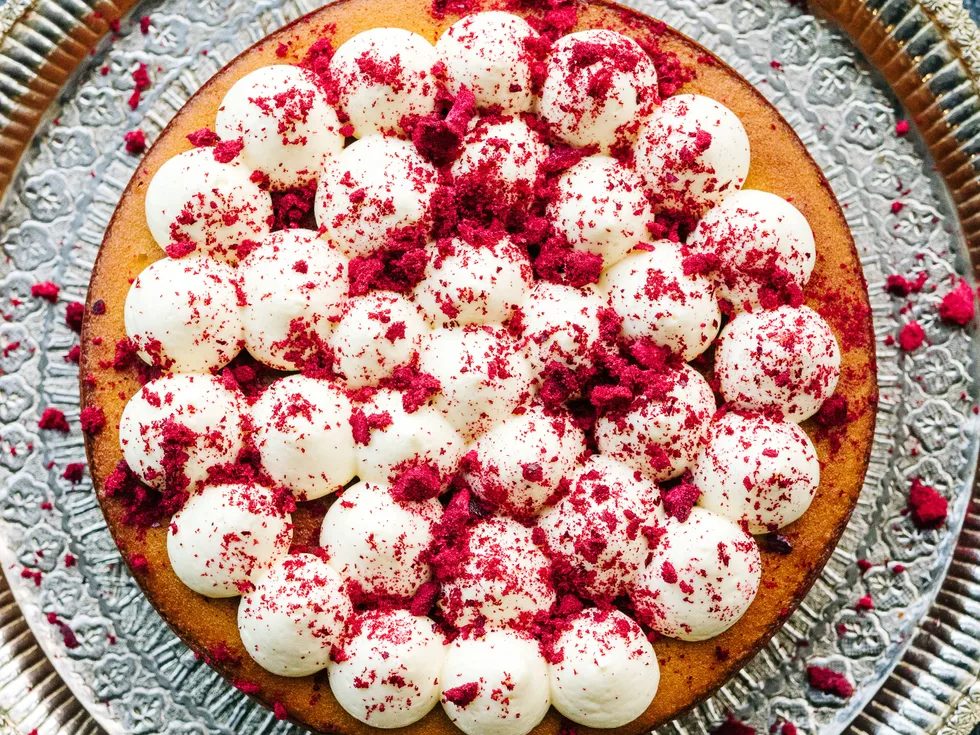 Turmeric and almond torte with passionfruit curd and labneh mousse