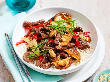 Beef stir-fry with mixed mushrooms and sesame seeds